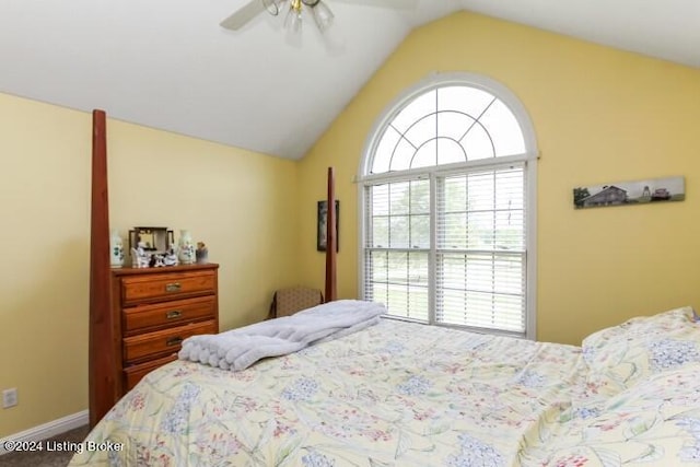 bedroom with ceiling fan and lofted ceiling