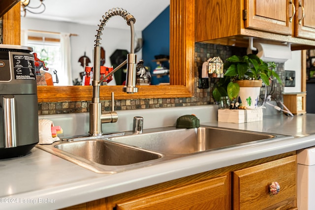 kitchen with sink and backsplash