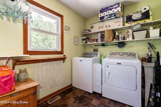 washroom featuring separate washer and dryer