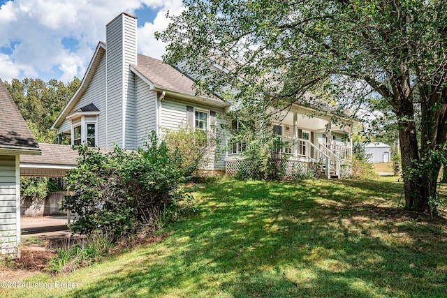 exterior space featuring a lawn