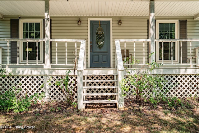 entrance to property with a porch