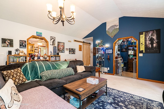 living room with lofted ceiling, an inviting chandelier, a barn door, and carpet flooring