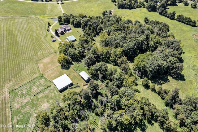 birds eye view of property with a rural view