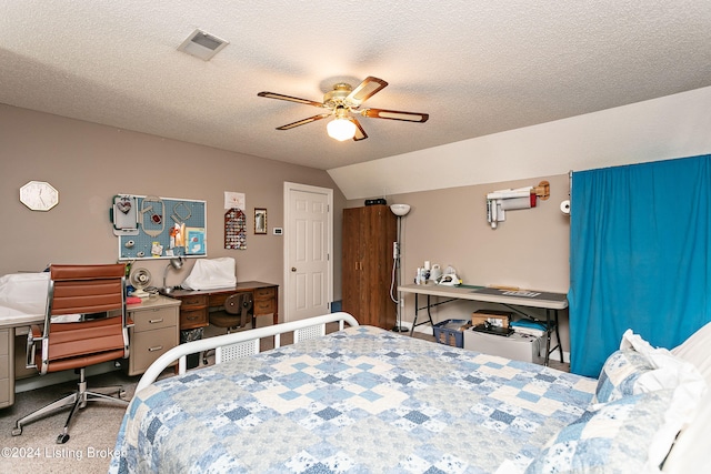 carpeted bedroom featuring a textured ceiling, ceiling fan, and lofted ceiling