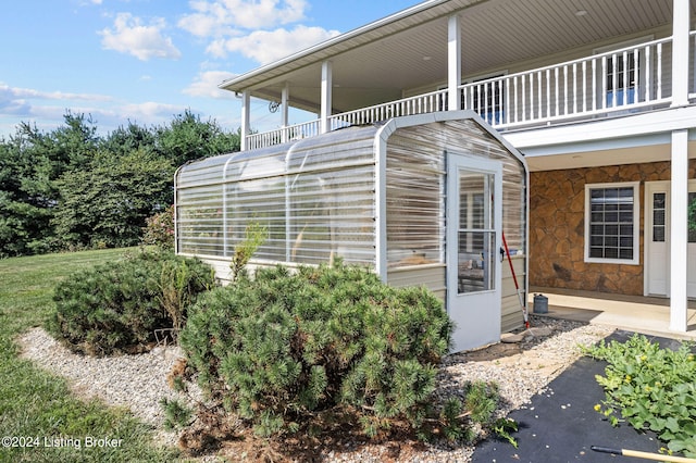 exterior space with a balcony