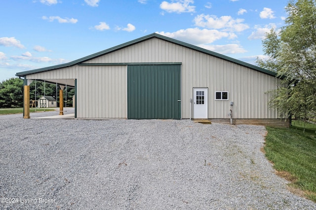 view of outbuilding with a garage