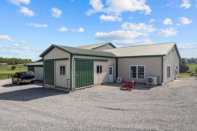 exterior space with ac unit