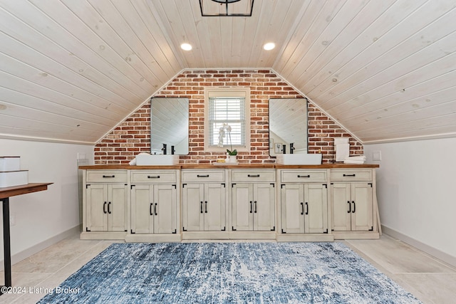 interior space with wood ceiling, brick wall, and light tile patterned flooring