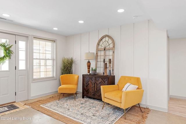 living area with light hardwood / wood-style flooring