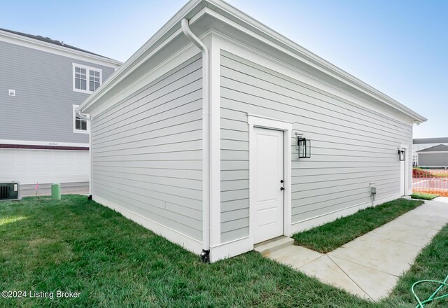 view of outbuilding featuring central AC