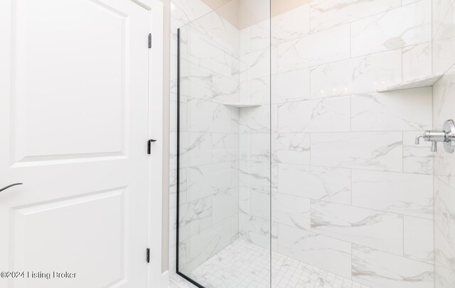 bathroom featuring walk in shower