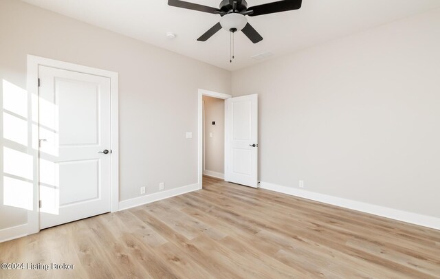 interior space with ceiling fan and light hardwood / wood-style floors