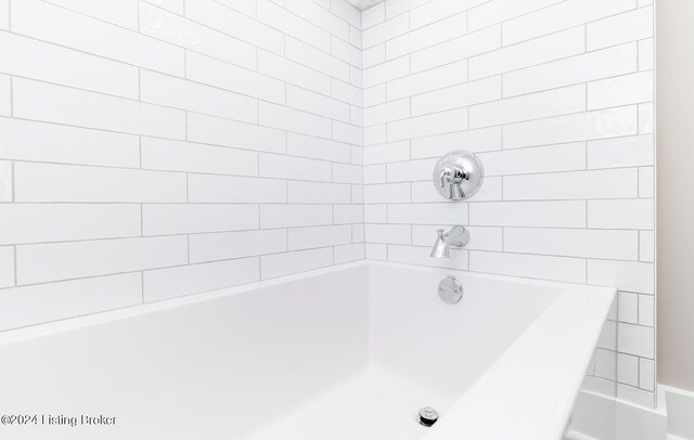 bathroom featuring a bath