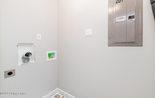 laundry room with hookup for a washing machine, electric panel, and hookup for an electric dryer