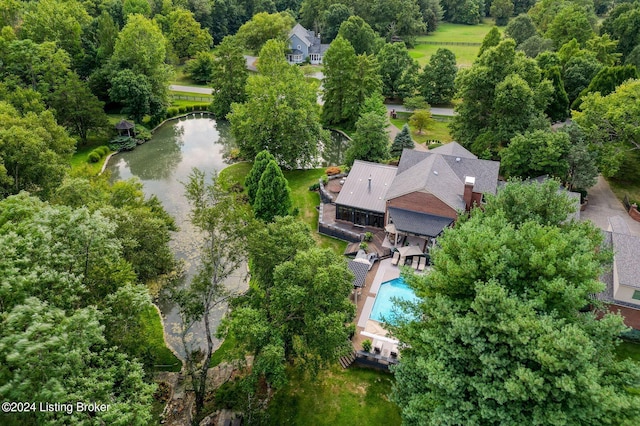 birds eye view of property featuring a water view