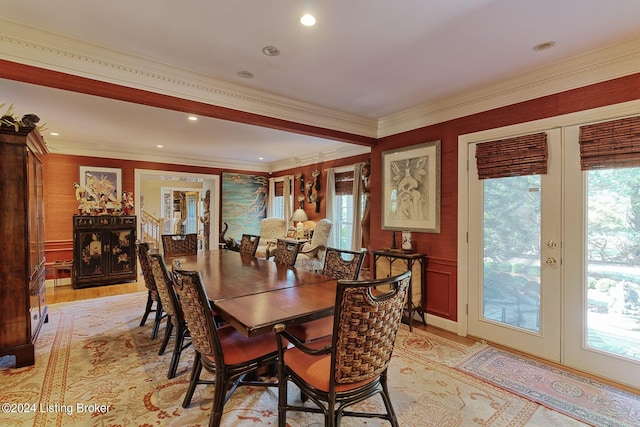 dining area with light wood-type flooring, french doors, crown molding, and recessed lighting