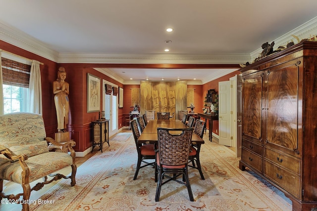 dining room with recessed lighting and crown molding