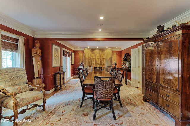 dining room featuring crown molding and recessed lighting