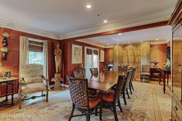 dining area featuring french doors, light wood-style flooring, ornamental molding, and recessed lighting
