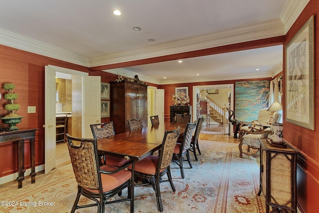 dining room with recessed lighting, stairway, light wood-style flooring, a barn door, and ornamental molding