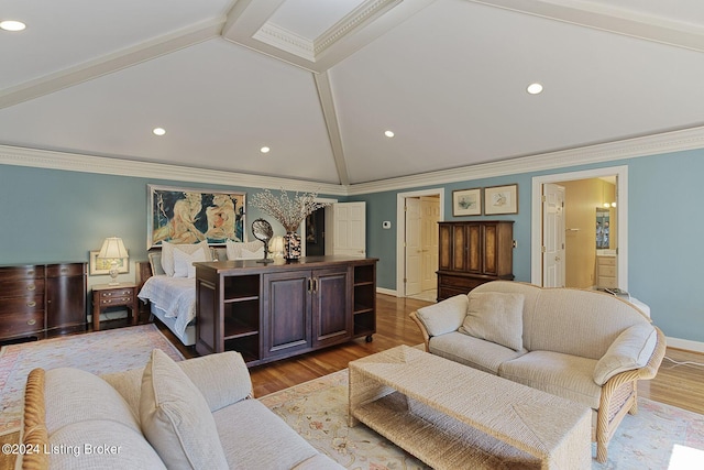 living room with crown molding, vaulted ceiling with beams, baseboards, and wood finished floors