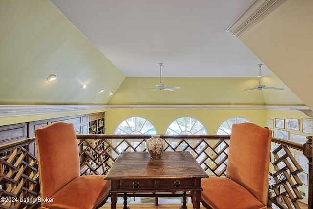dining space with lofted ceiling and a ceiling fan