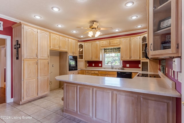 kitchen with light tile patterned floors, crown molding, sink, black appliances, and ceiling fan