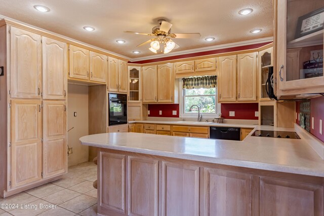 kitchen featuring crown molding, black appliances, kitchen peninsula, sink, and ceiling fan