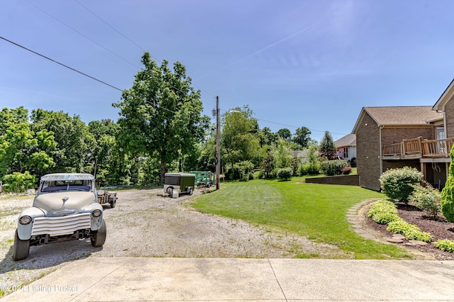 view of yard featuring a deck