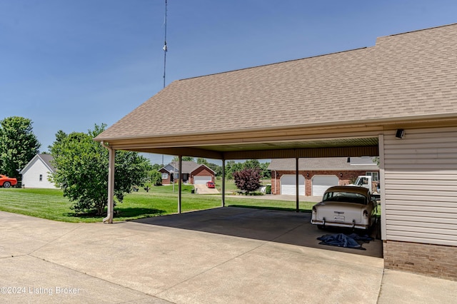 view of parking featuring a garage, a yard, and a carport