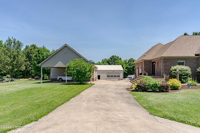 view of front facade featuring a front yard and a garage