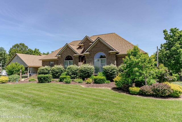 view of front of home featuring a front lawn