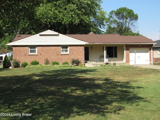 single story home with a front yard and a garage