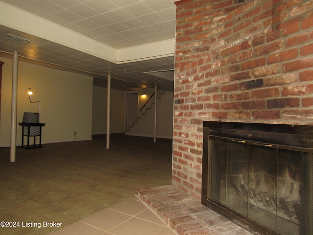 basement with a fireplace