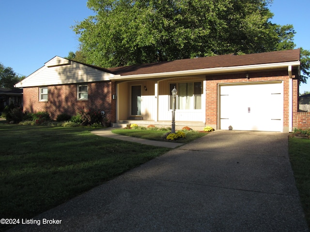 single story home featuring covered porch, a front yard, and a garage