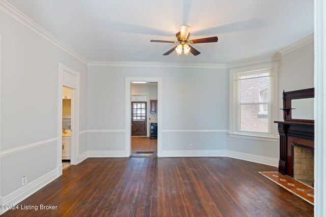 unfurnished living room featuring ceiling fan, dark wood-type flooring, and crown molding