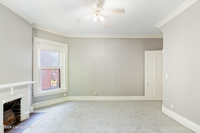 unfurnished living room featuring ceiling fan, light carpet, and ornamental molding