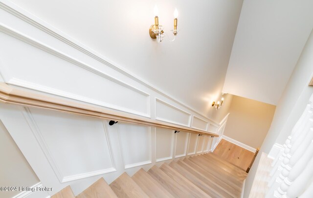 staircase featuring hardwood / wood-style floors