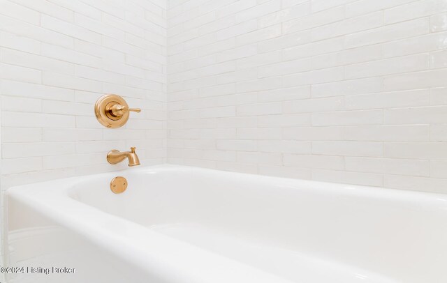 bathroom with a bathing tub