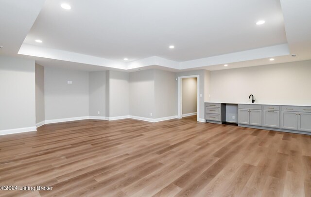 basement with light wood-type flooring