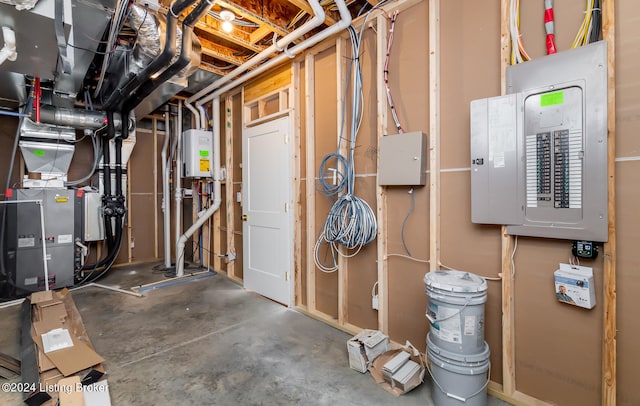 basement featuring water heater and electric panel