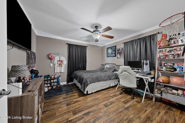 bedroom with a ceiling fan, ornamental molding, and wood finished floors