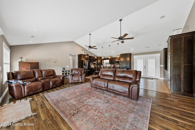 living room with lofted ceiling, baseboards, dark wood-style flooring, and recessed lighting