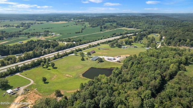 aerial view featuring a rural view and a water view