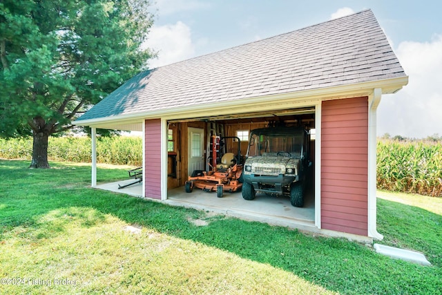 exterior space with a lawn and an outbuilding