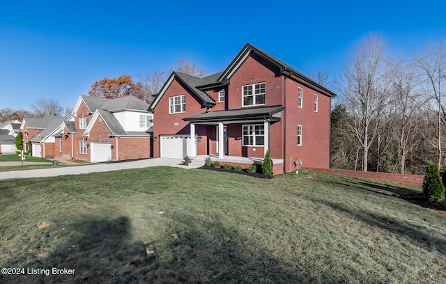 view of front property with a front yard and a garage