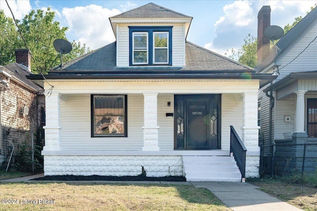 bungalow-style house featuring covered porch