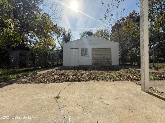 view of outbuilding with a garage