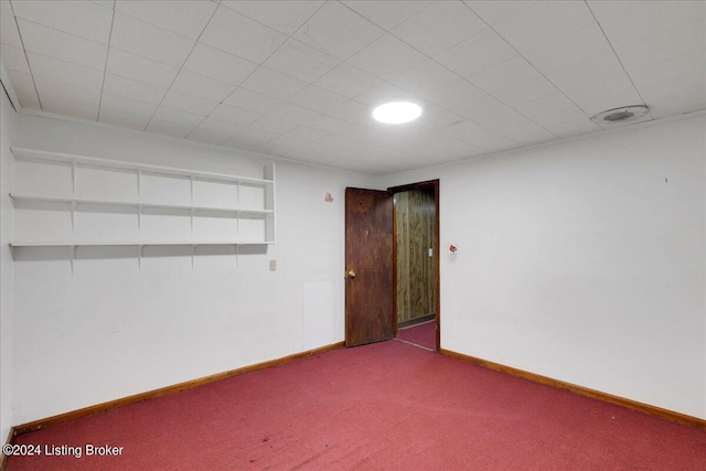 unfurnished room with carpet floors