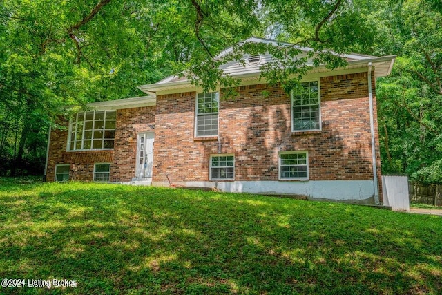 view of front of home with a front yard